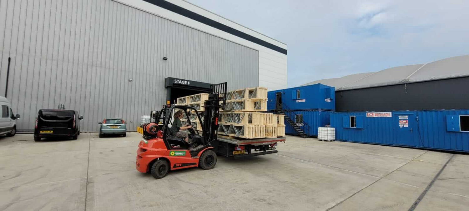 posi-joists being moved by a forklift