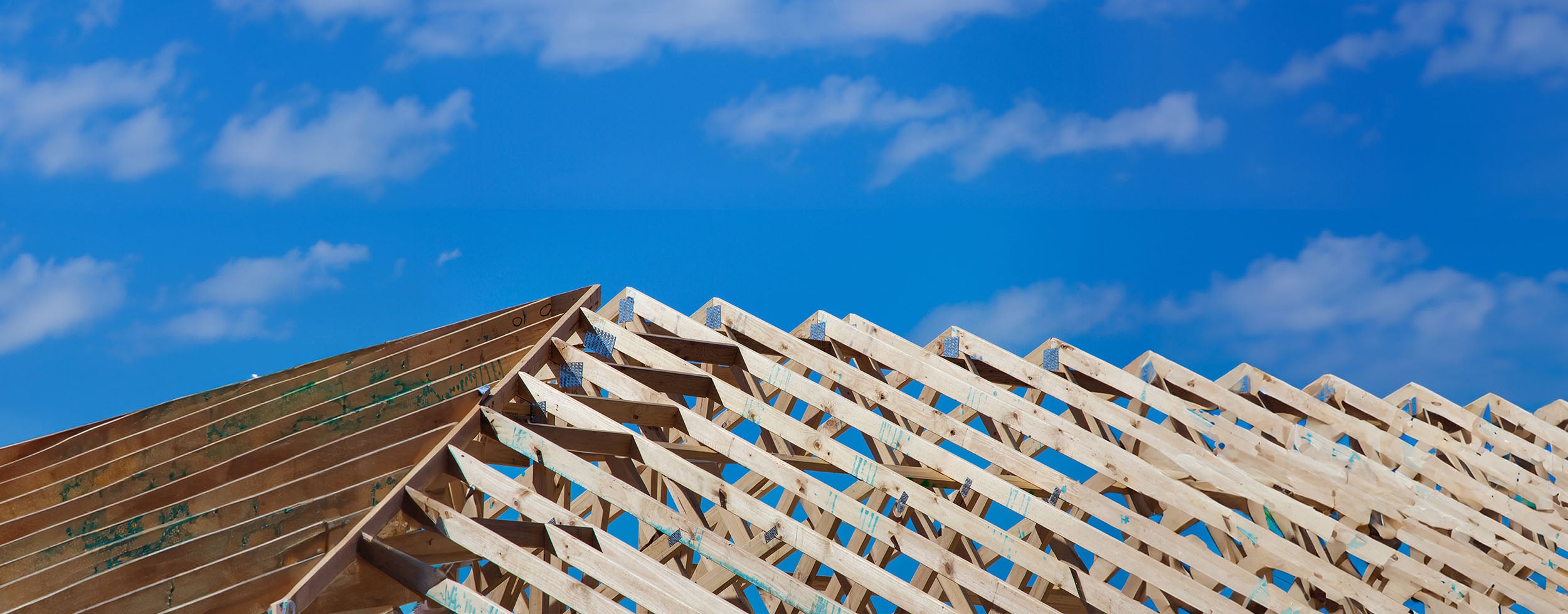 Roof trusses with blue sky