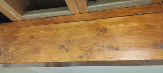 a treated glulam beam installed in a house