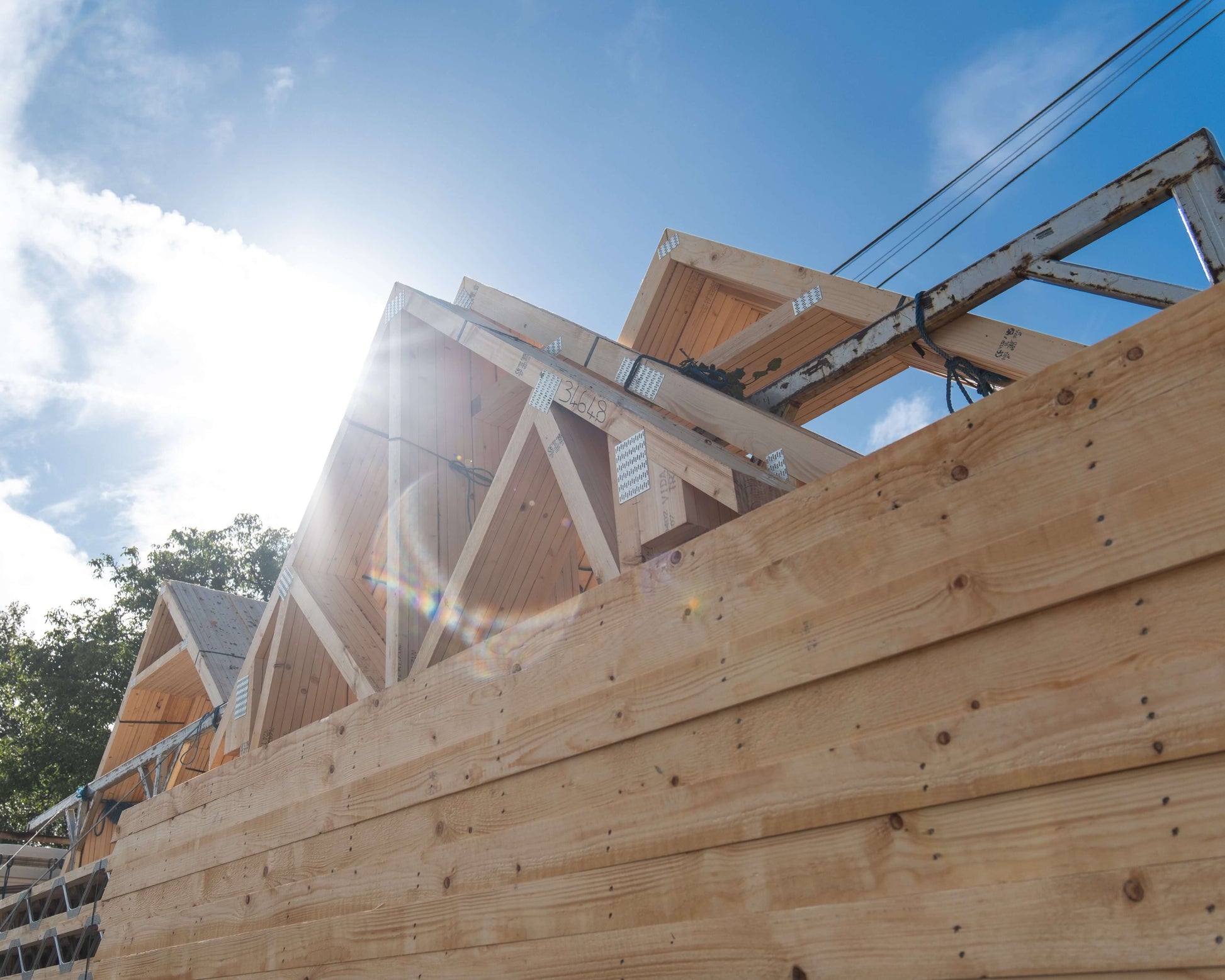 roof trusses with blue sky behind