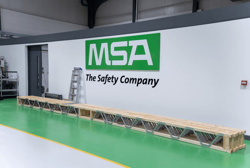 Large posi-joists on the floor in a factory