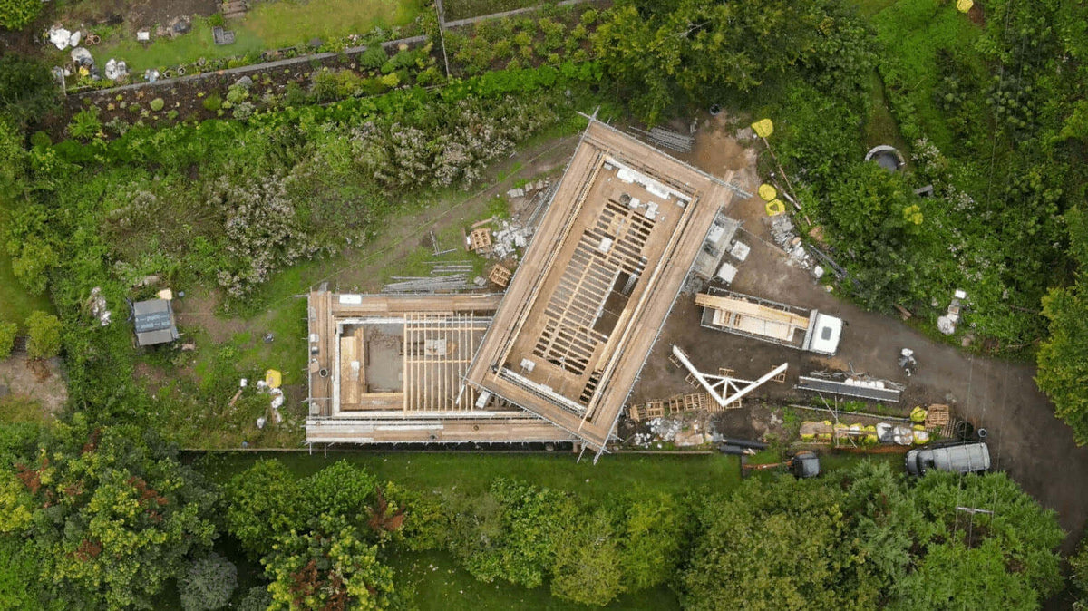 an aerial view of posi-joists installed on a building in Lydney, Gloucestershire, surrounded with trees