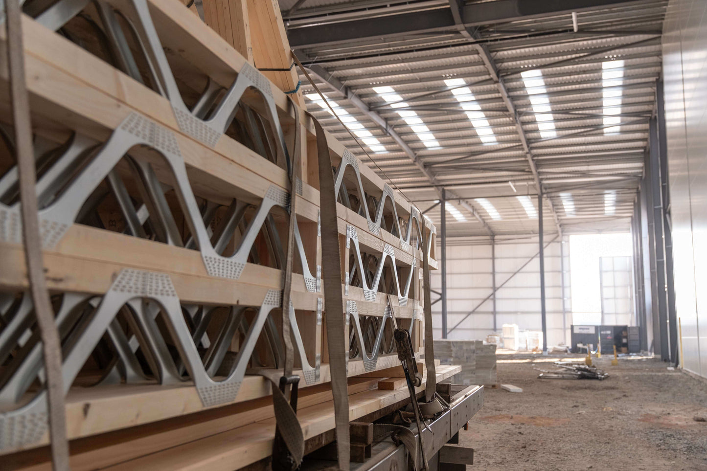 posi-joists being delivered to a large factory