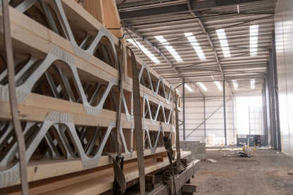 posi-joists being delivered to a large factory