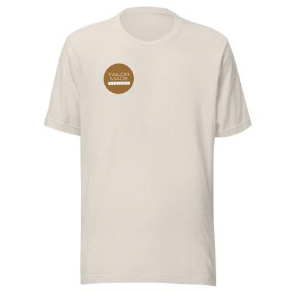 front of white tshirt with circular tailor made designs logo on chest